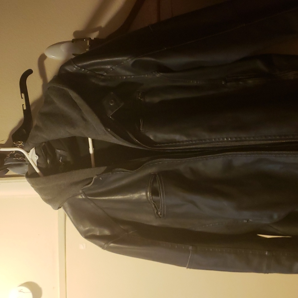 Leather jacket w hoodie.